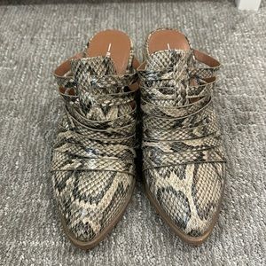 Snakeskin wedge boots